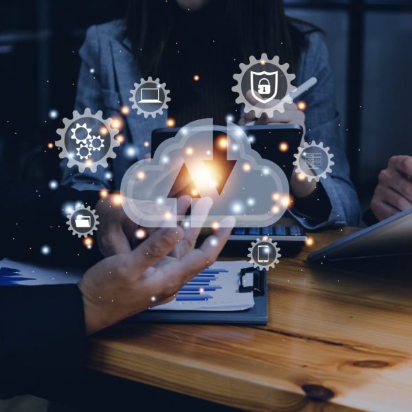 man use Laptop with cloud computing diagram show on hand. Cloud technology. Data storage. Networking and internet service concept.